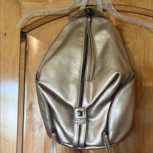 Gold Backpack with Zipper Details